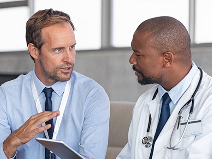 Doctor meeting with a vendor