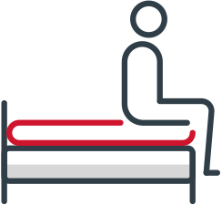 Patient sitting on a bed